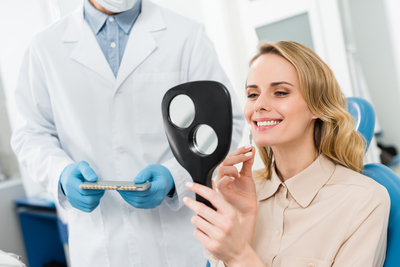 happy smiling woman with invisible braces